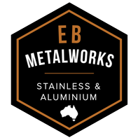 EB Metalworks hexagon logo in black, gold, and white with “Stainless & Aluminium” and an Australia silhouette