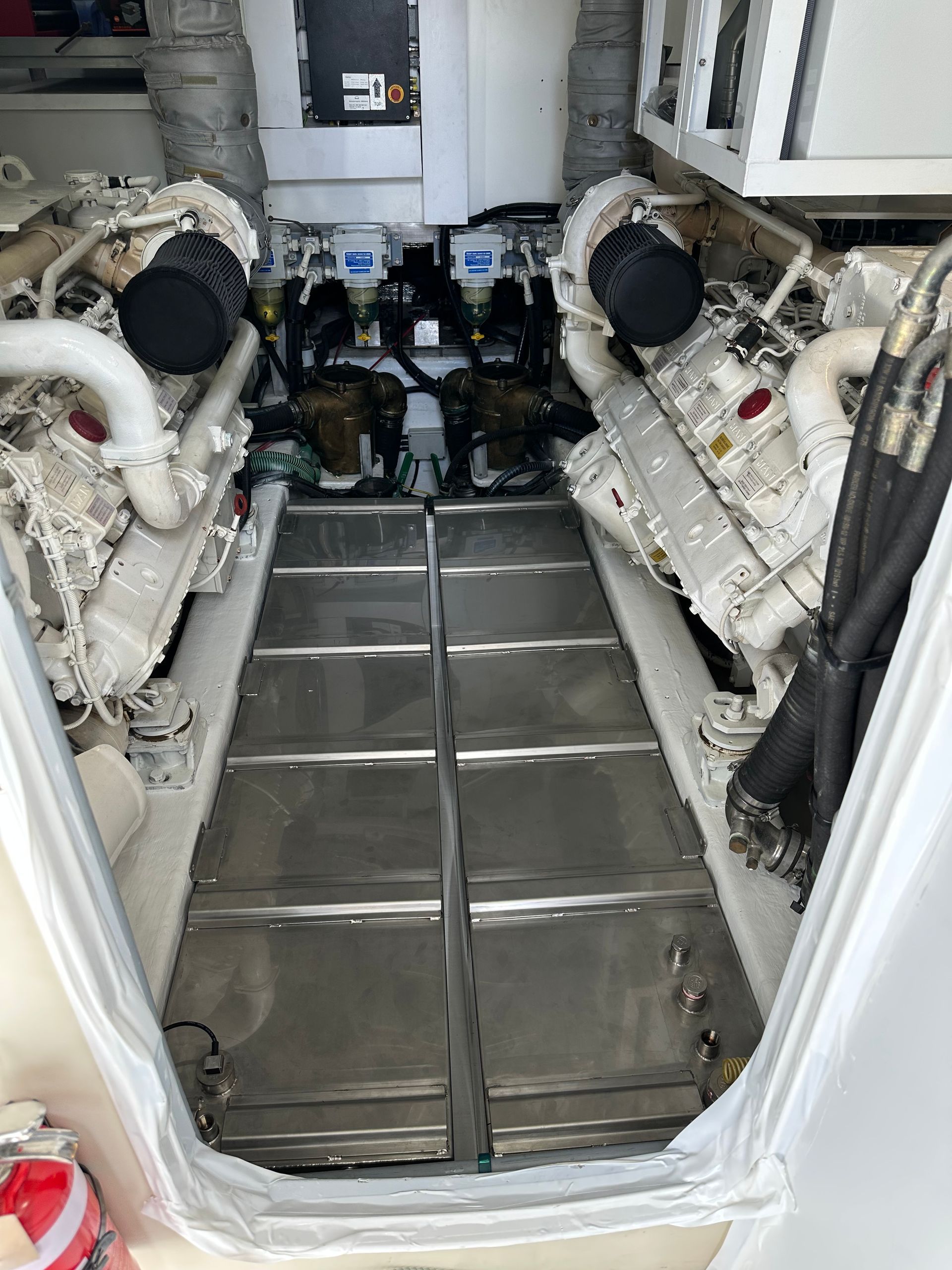 Inside a Boat or Aircraft Cabin, Two White Engine Units Flank — EB Metalworks in Somersby, NSW
