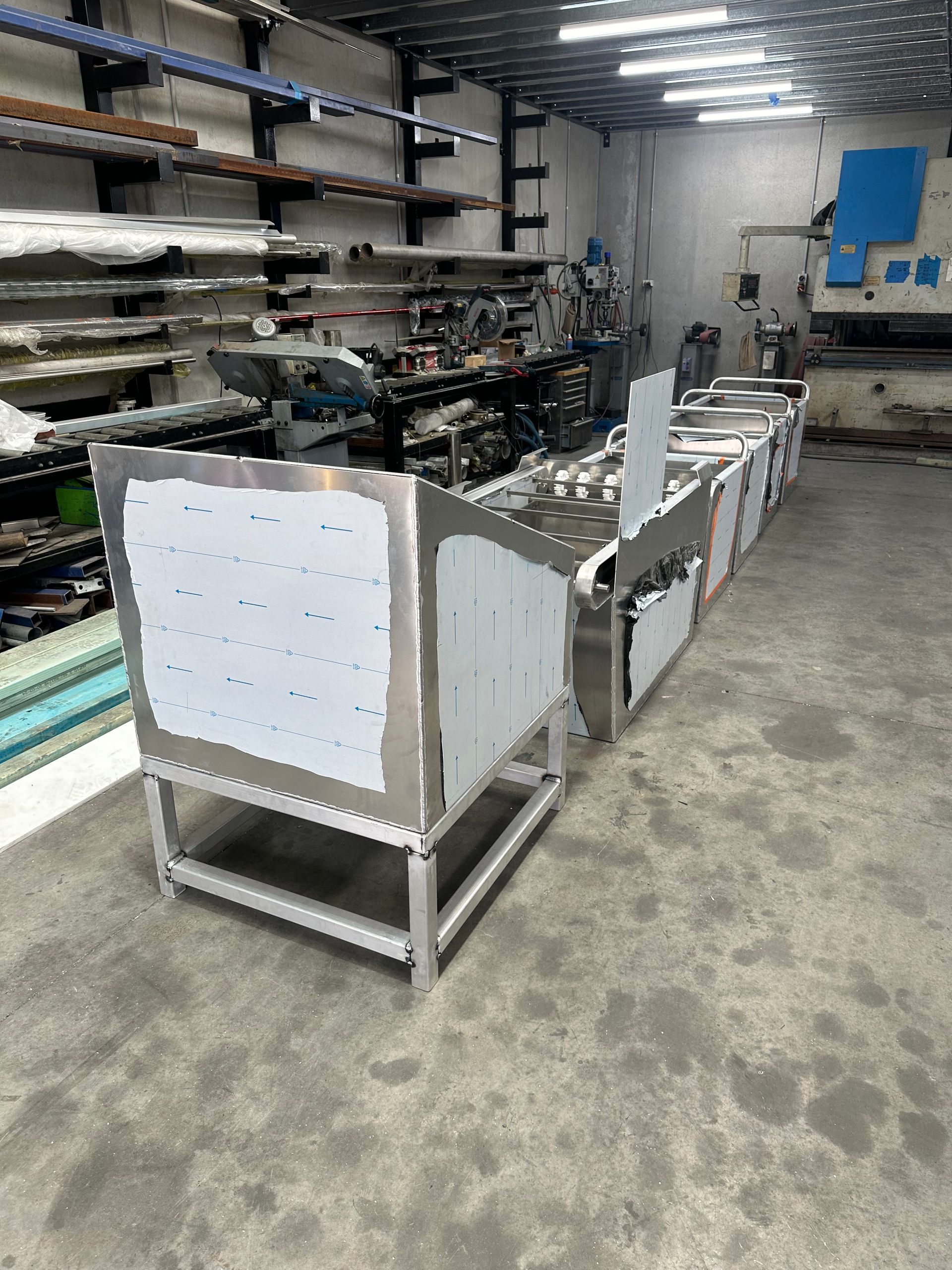 Factory Workshop with Metal Shelving and A Long Industrial Machine — EB Metalworks in Berkeley Vale, NSW