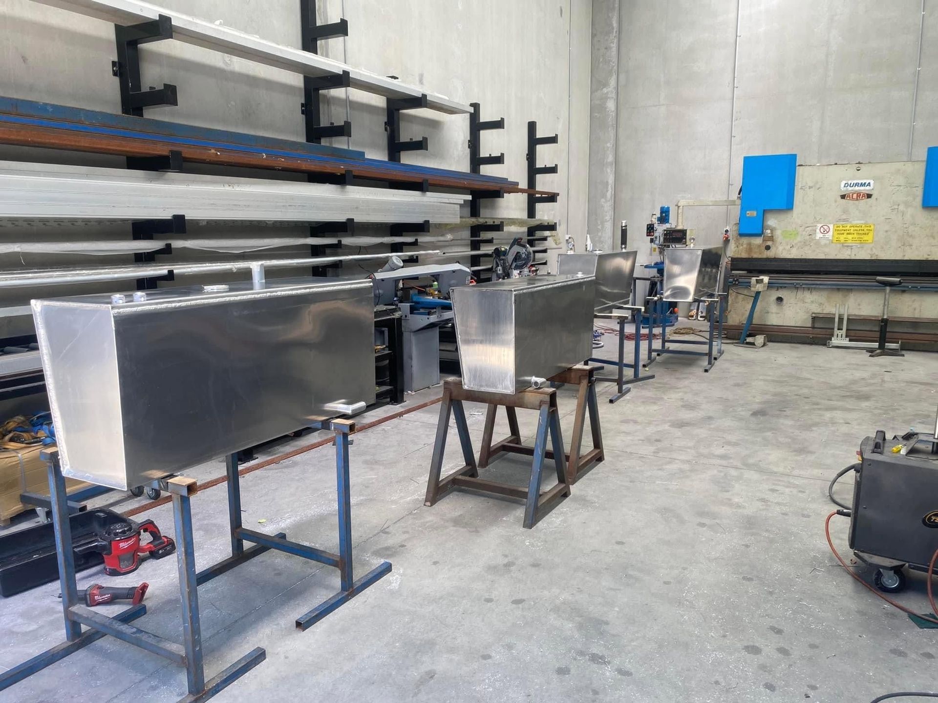 Industrial Workshop with Metal Sheets on Stands — EB Metalworks in Somersby, NSW