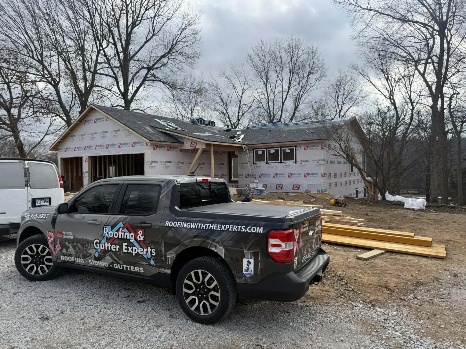 Recent residential roofing project completed by Roofing and Gutter Experts in Northwest Arkansas
