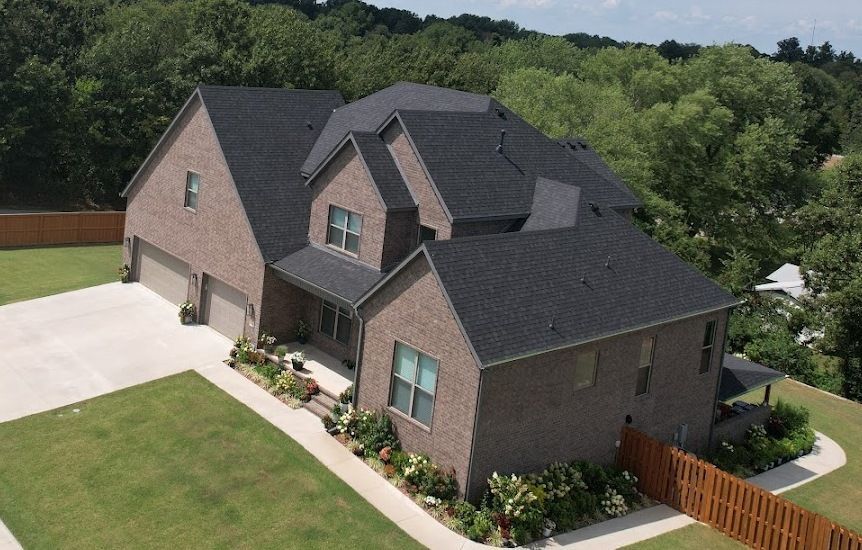 Recent roof replacement completed by Roofing and Gutter Experts