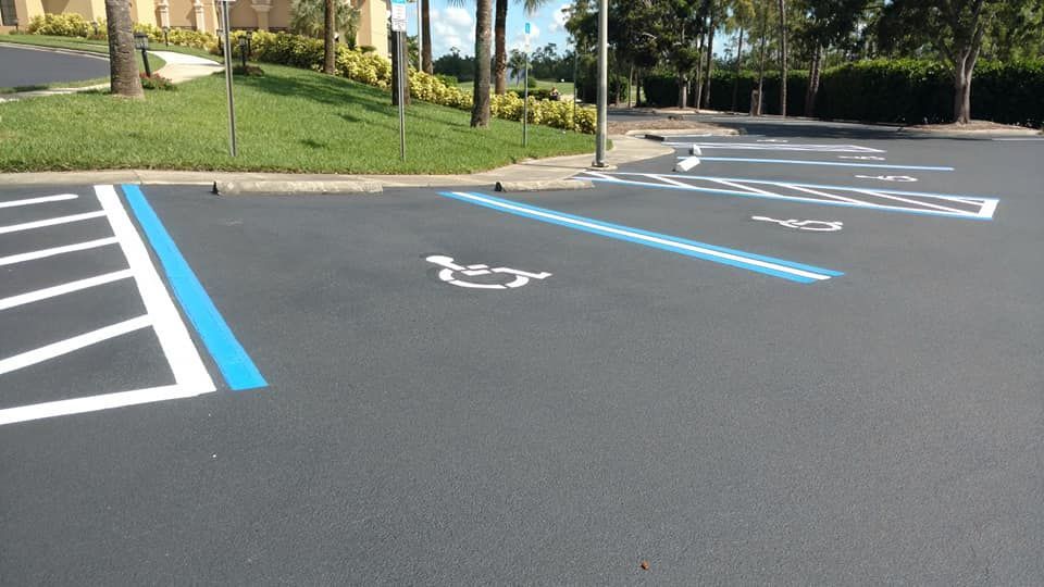A handicapped parking spot in a parking lot