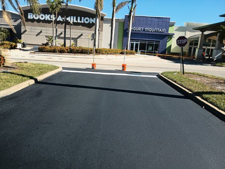A stop sign is in front of a building that says books a million