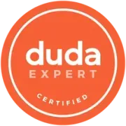 An orange circular badge with the white text 
