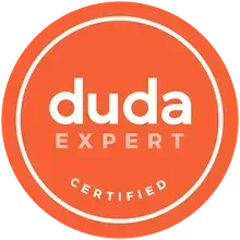 Orange circle badge with white text reading 