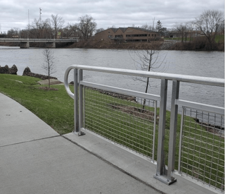A Fence With A View Of A River And A Bridge – Mishawaka IN - Milestone Fence
