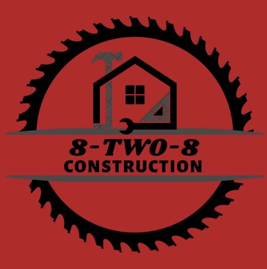 Logo for Vanguard Construction: Yellow house outline with tools, blue and yellow color scheme.