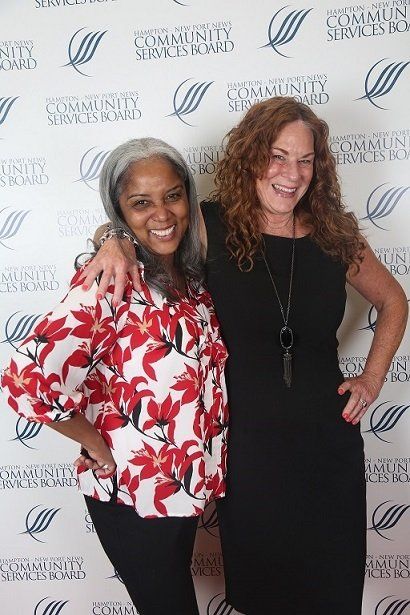 Nikelda, 15-years and Carol, 25-years of service recognized employees