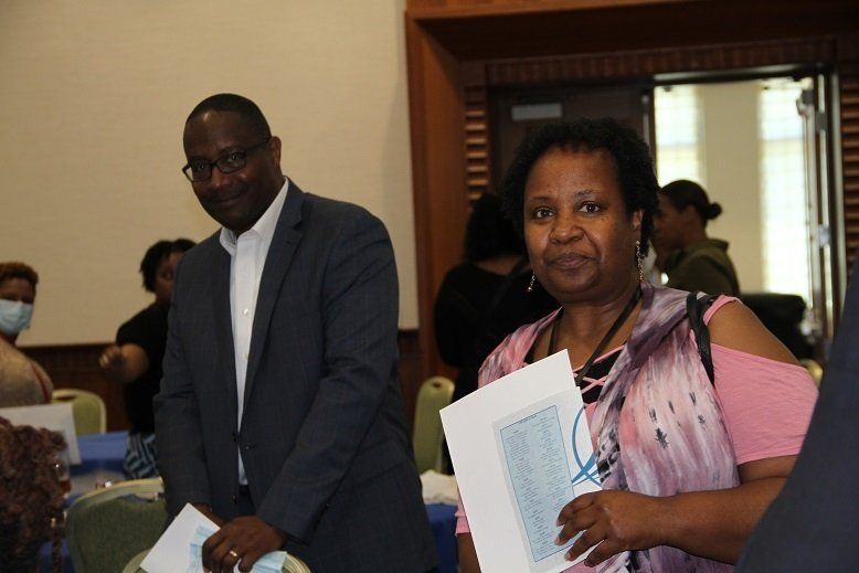 Win, 10-years, and Marcia, 25-years of service recognized employees