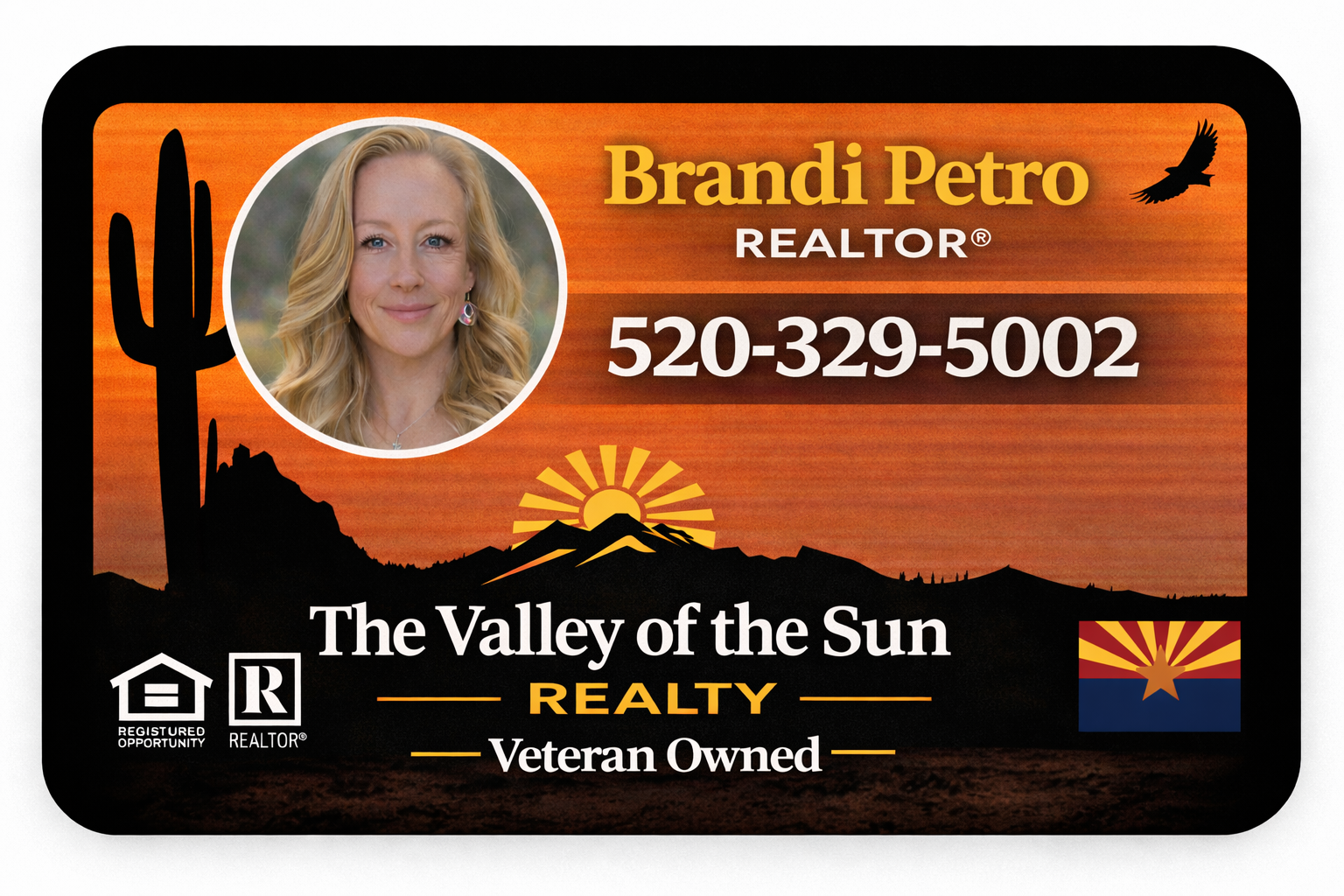 Business card for Brandi Petro, Realtor, featuring a desert landscape, contact number, and company information.
