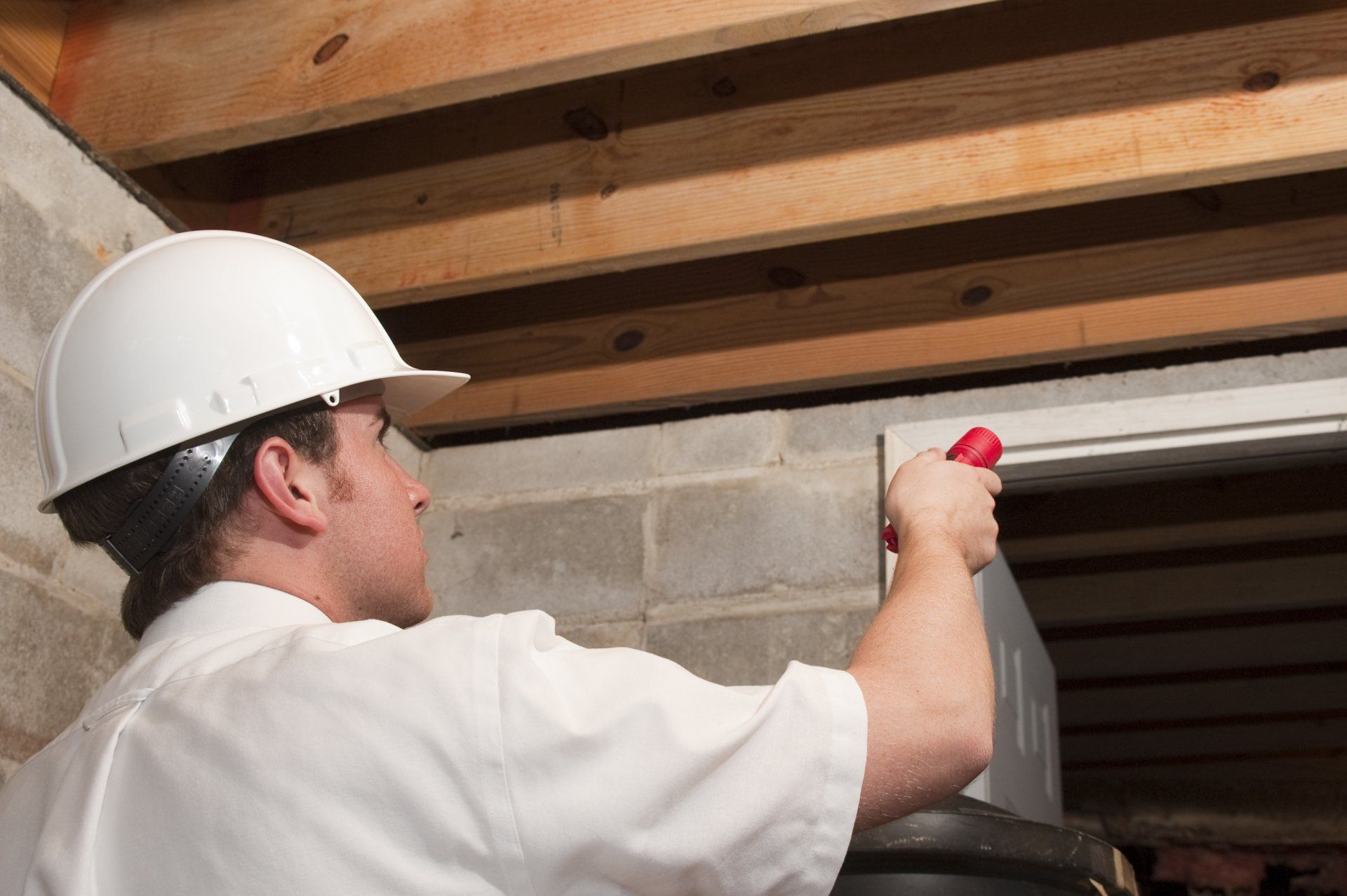 Man with flashlight - Decatur, AL - Home Inspection Pros Man with flashlight - Decatur, AL - Home Inspection Pros
