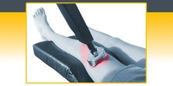 A person is getting a laser treatment on their leg A person is getting a laser treatment on their leg