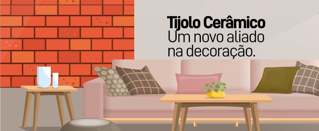Uma sala de estar com um sofá, mesa e parede de tijolos.