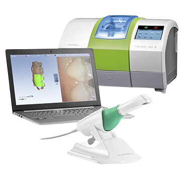 Dental equipment setup: scanner, laptop with dental model, and milling machine.