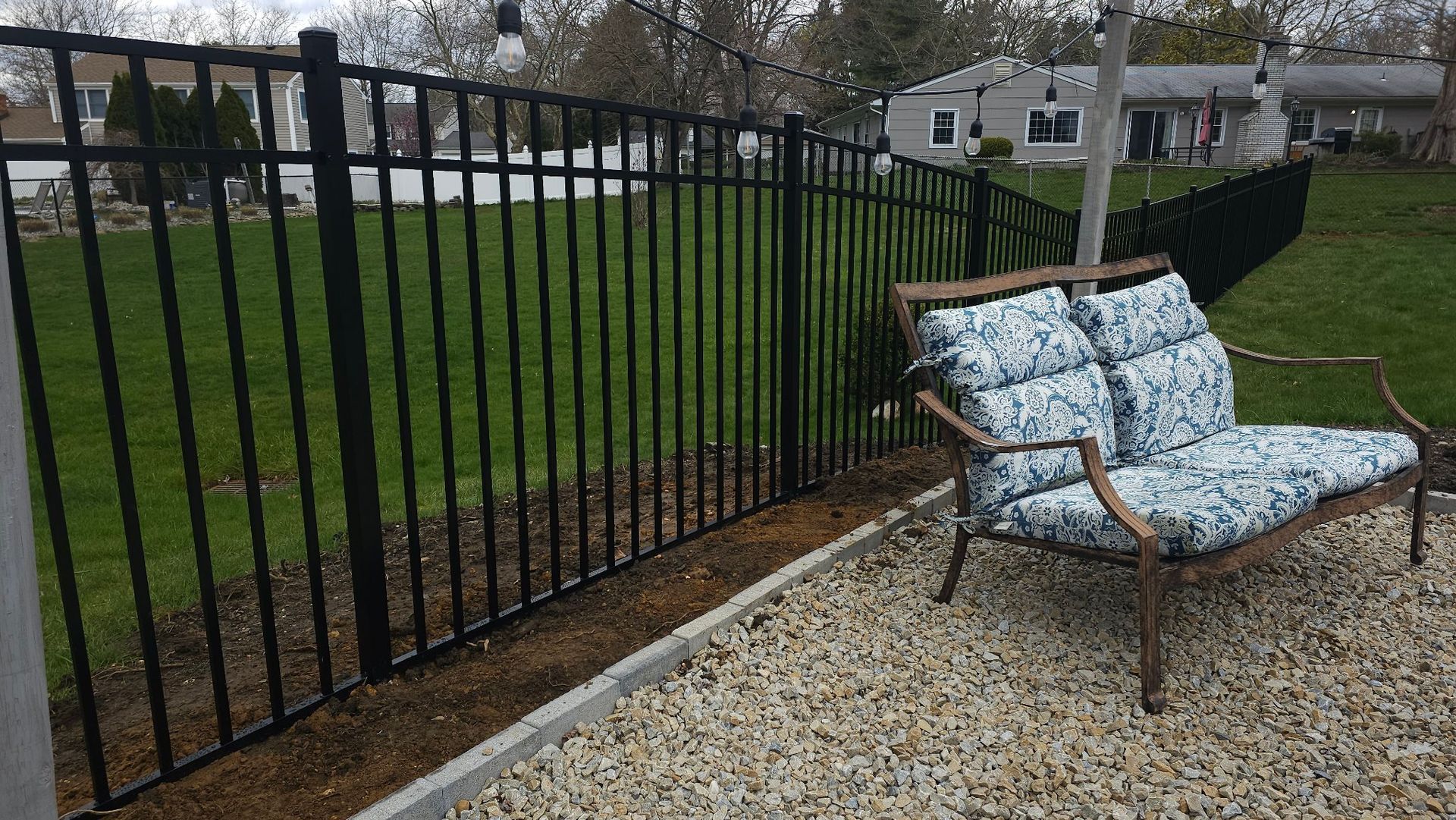 Black aluminum fence installed by Solanos Fence