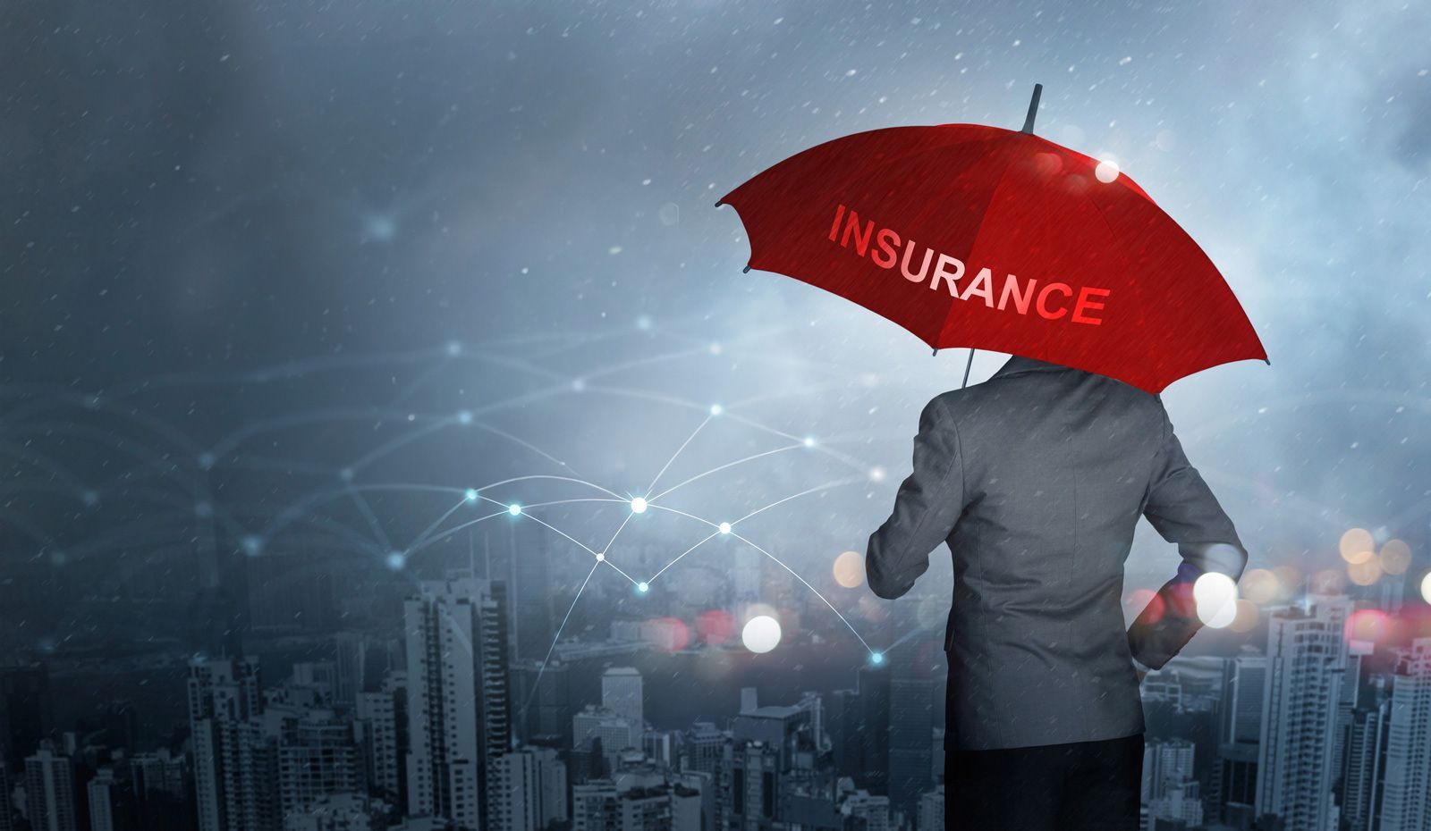 Man Holding Umbrella — Huntingdon Valley, PA — Huntingdon Insurance Group