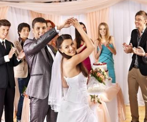 groom twirling bride