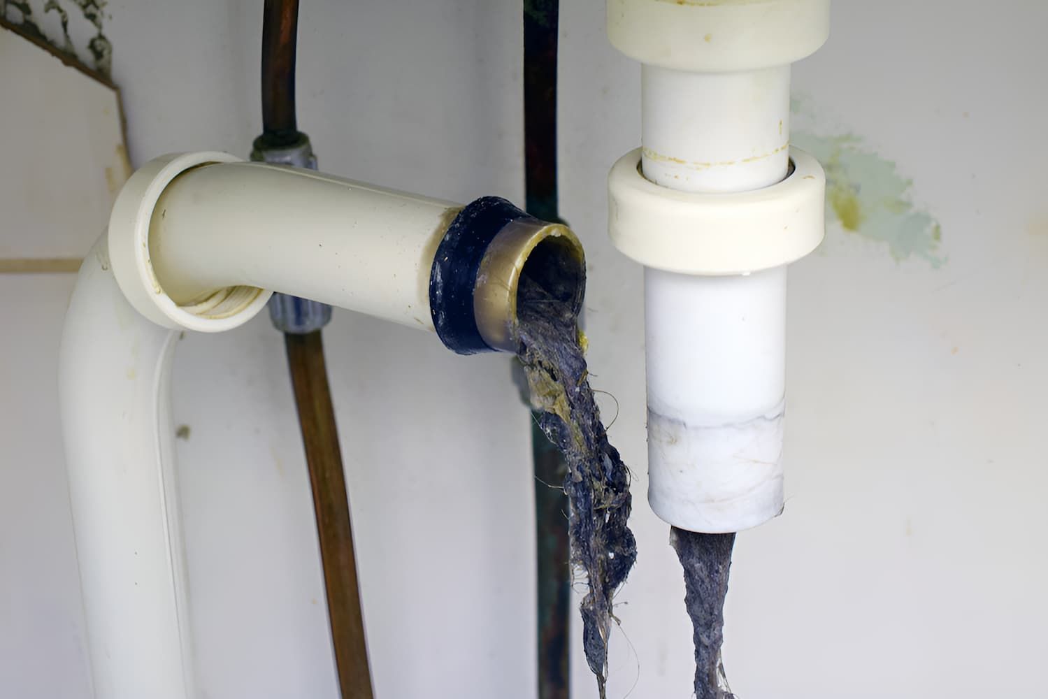 A Close Up Of A Drain Pipe With A Lot Of Waste — GPS Plumbing, Drainage & Gasfitting In Dubbo, NSW
