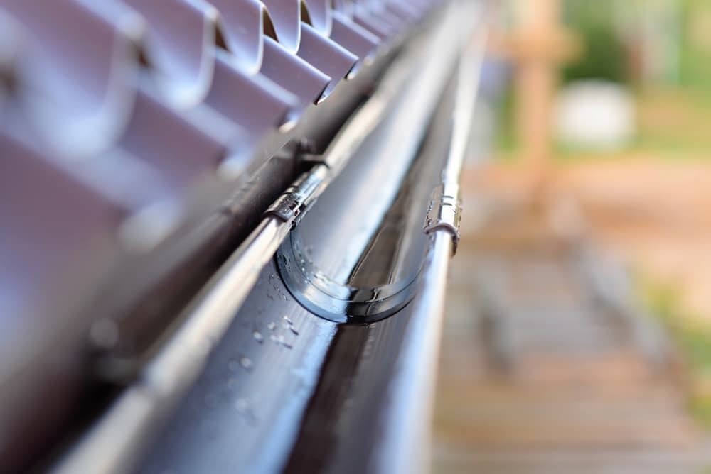 A Close Up Of A Gutter On A Roof — GPS Plumbing, Drainage & Gasfitting In Dubbo, NSW