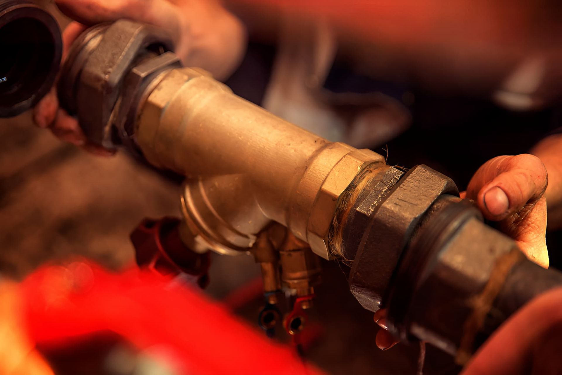 A Close Up Of A Person Working On A Pipe — GPS Plumbing, Drainage & Gasfitting In Dubbo, NSW
