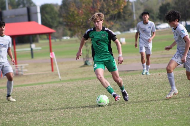 Boys soccer players in a game