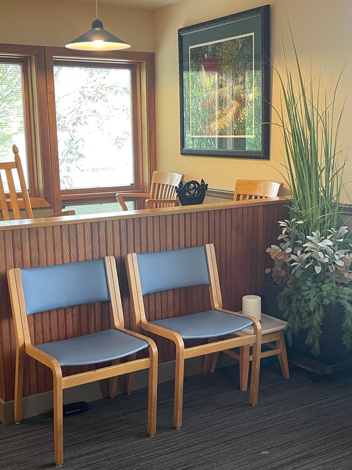 a waiting room with chairs and a picture on the wall located in carbondale Illinois