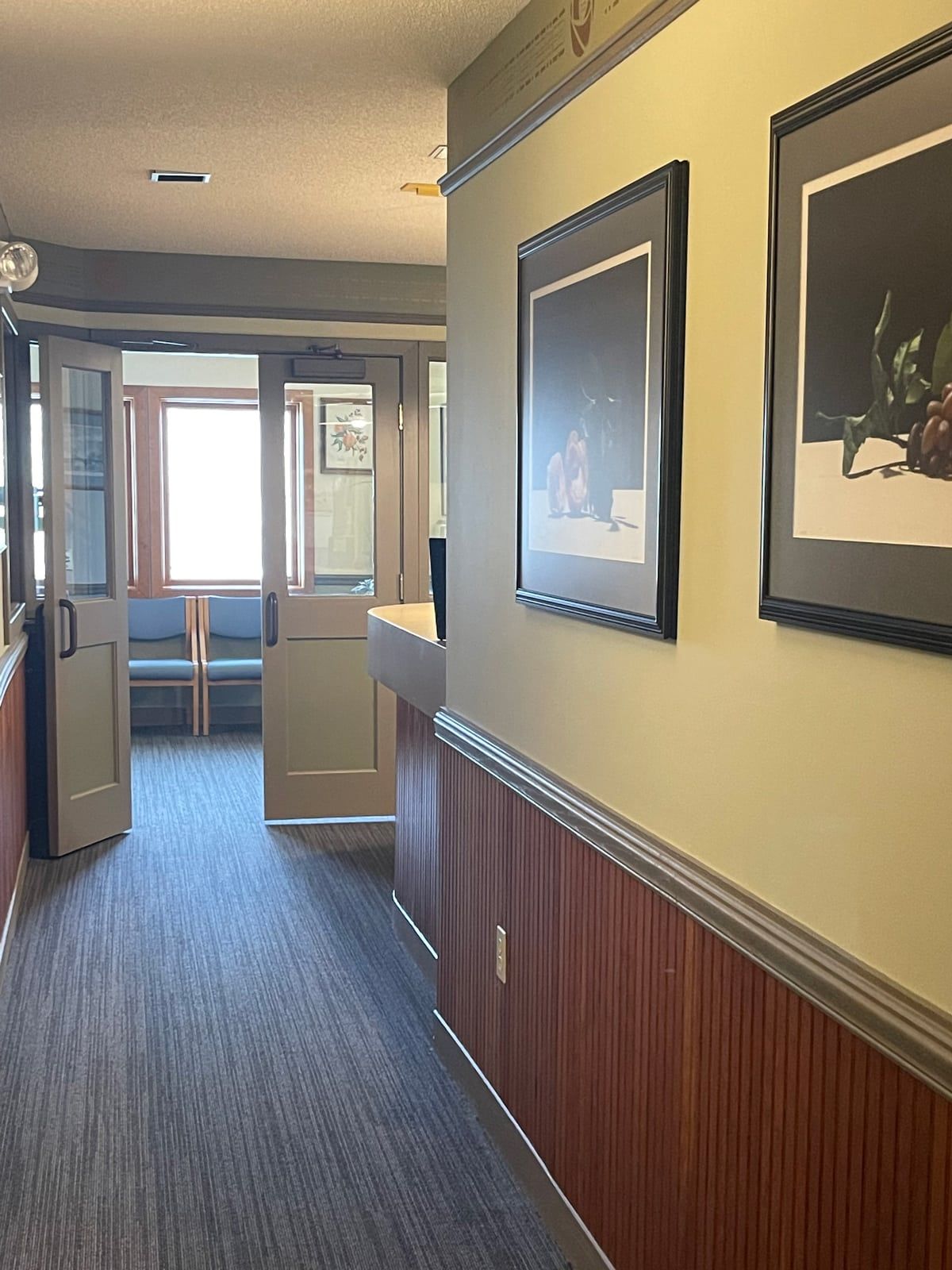 a hallway with a picture of a flower on the wall located in carbondale Illinois