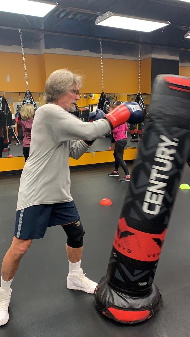 Old Man Training Boxing