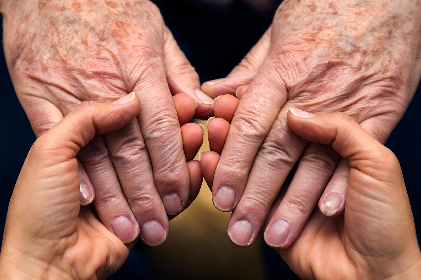 A Young Woman is Holding the Hands of an Older Woman — Active Lifestyle Supports In Kiama, NSW