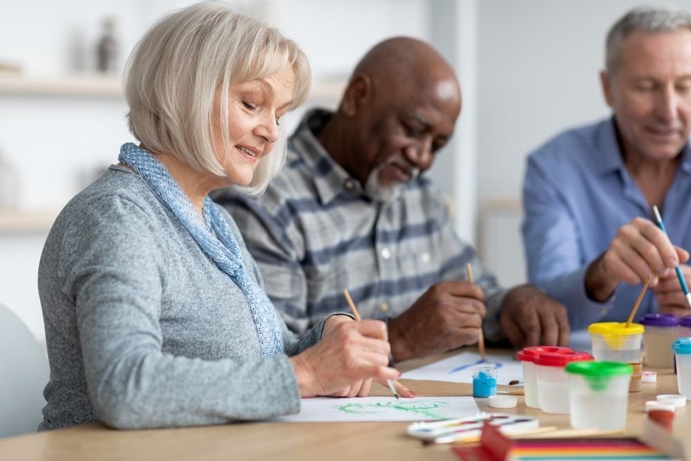 Elderly Man and Woman Painting — Active Lifestyle Supports In Tullimbar, NSW