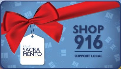 Blue Shop 916 gift card with red ribbon and Sacramento tag, “Support Local” text
