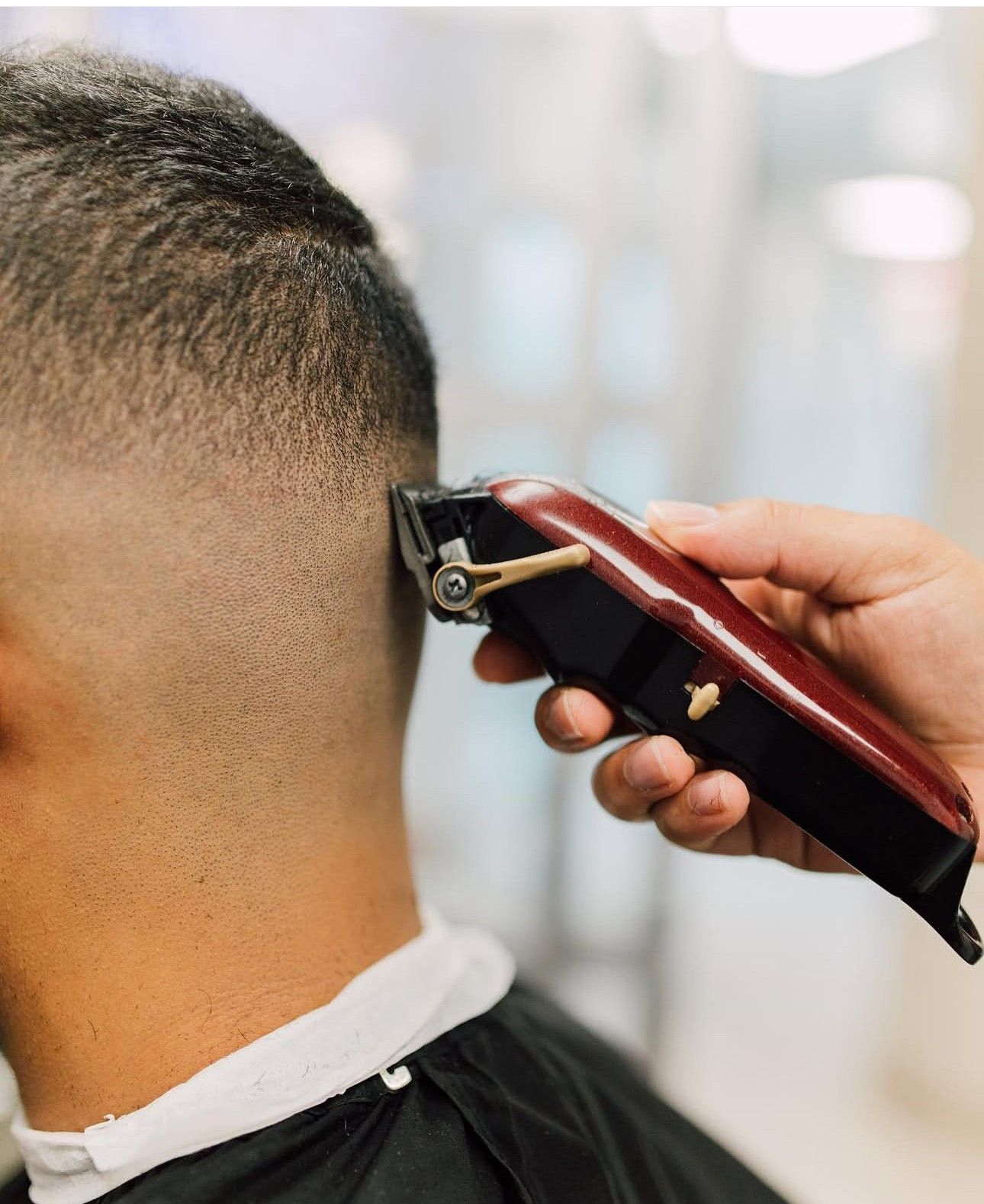 Skin fade with clippers at Palmetto Barber Studio