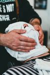 man recieving hot towel facial or shave