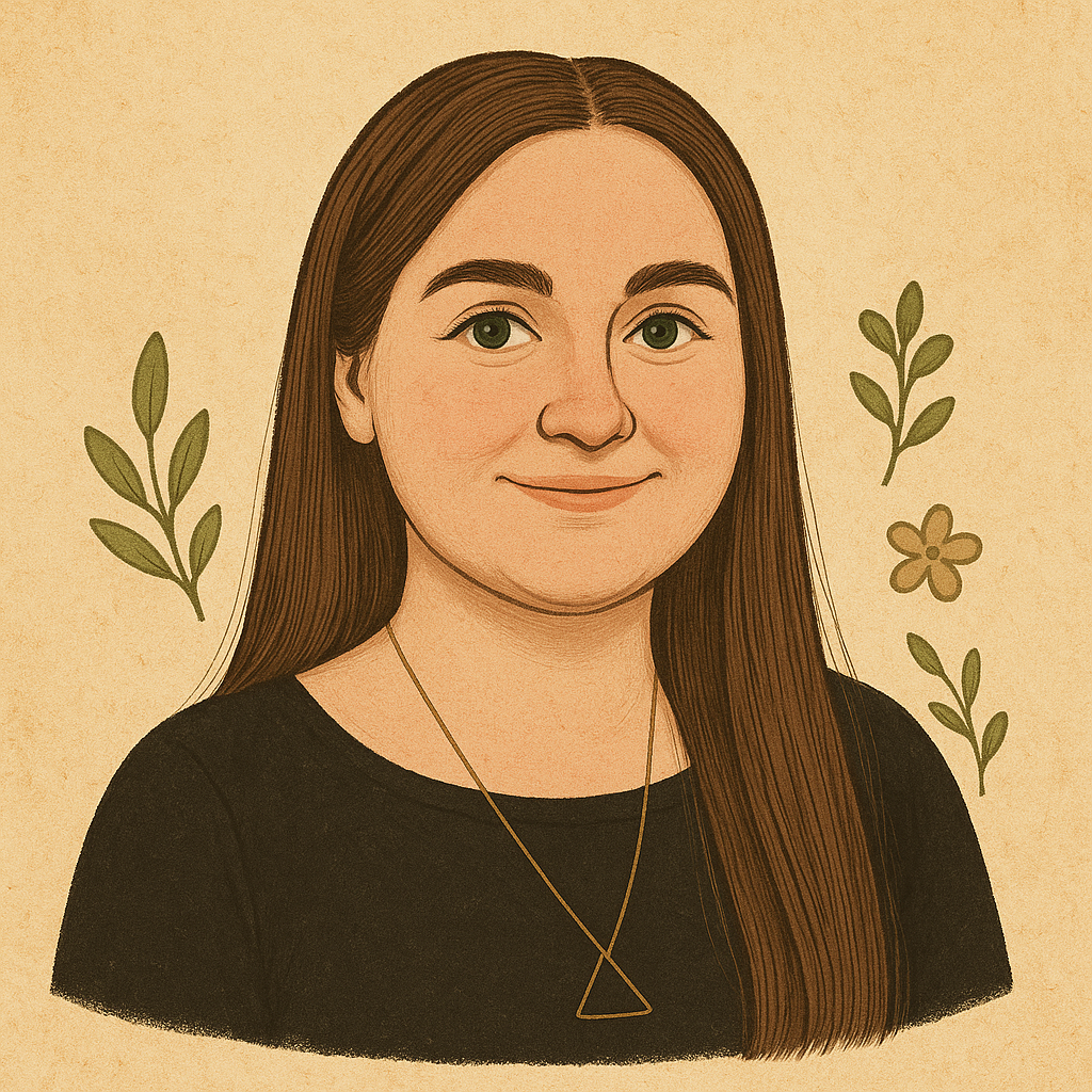 Woman with long brown hair wearing a black shirt and gold necklace, smiling. Surrounded by leaves and a flower.