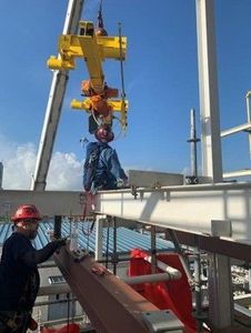 Two Men On The Massive Metal Structure — Crosby, TX — Advanced Overhead Crane Services Two Men On The Massive Metal Structure — Crosby, TX — Advanced Overhead Crane Services