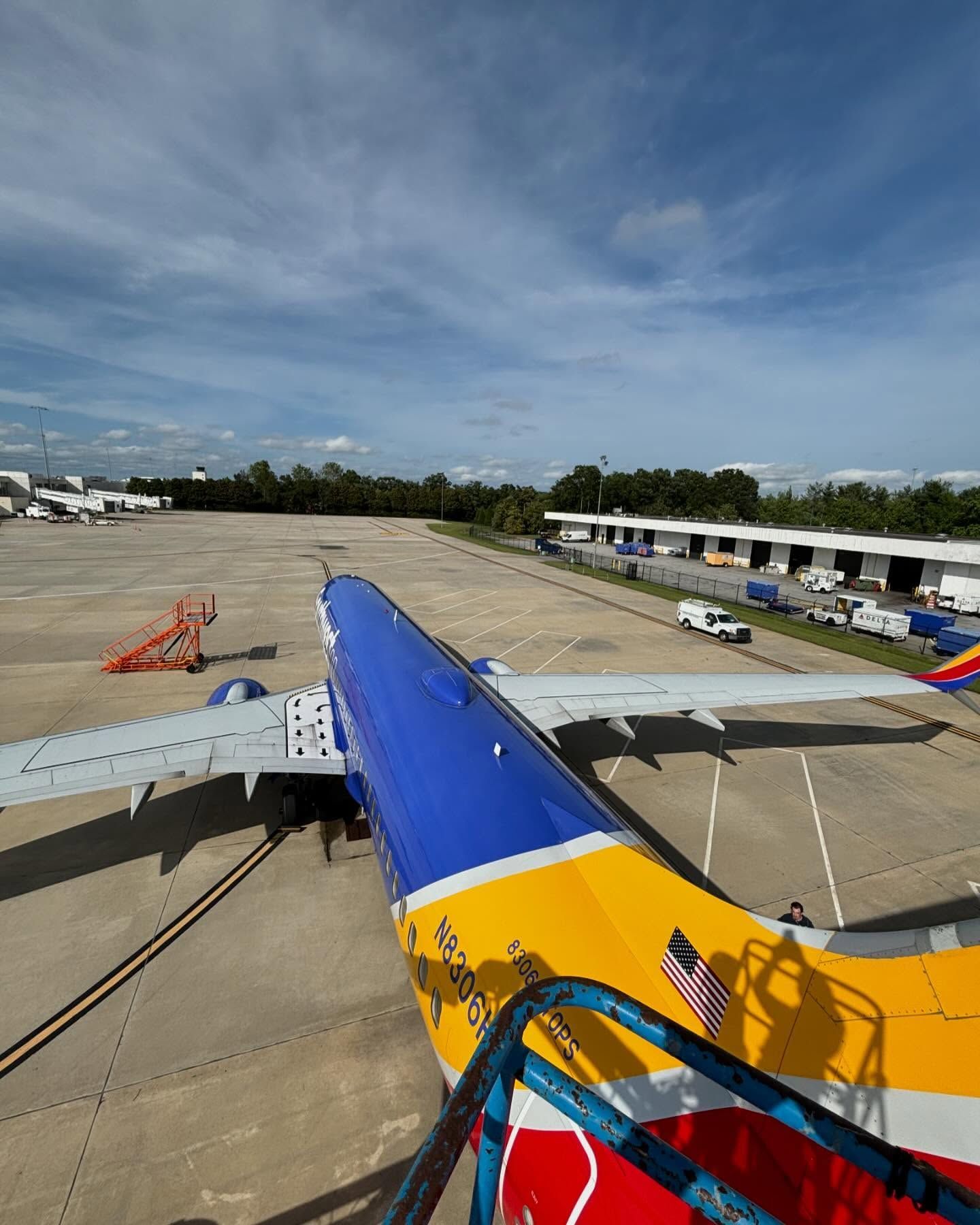 A southwest airlines plane is parked on the tarmac