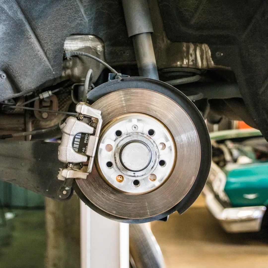 A Close Up Of A Brake Disc On A Car — Wilbraham, MA — Ken’s Automotive