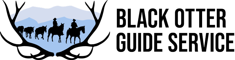 A logo for Black Otter Guide Service including a silhouette of a group of people riding horses in front of antlers.