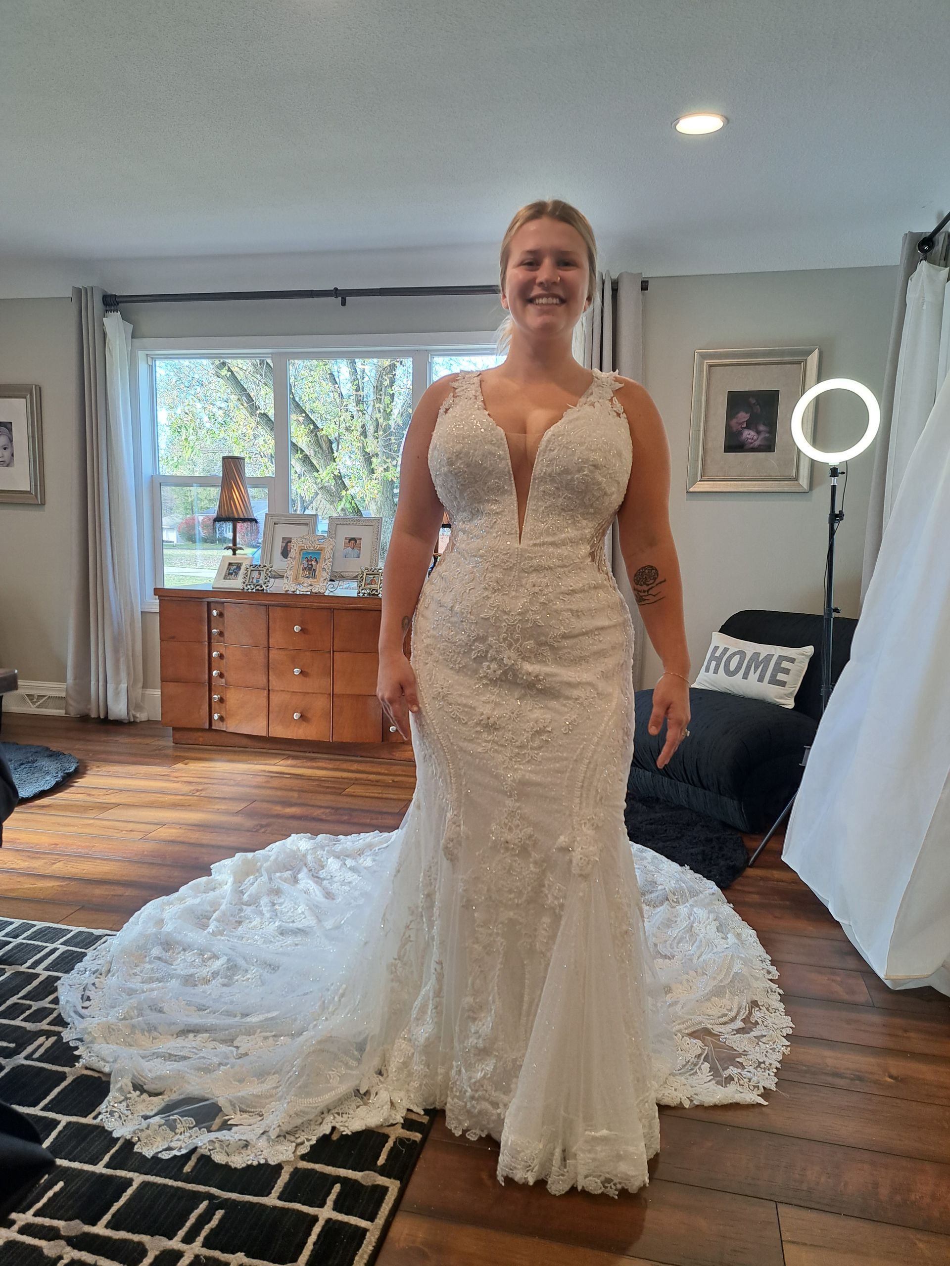 Woman in wedding gown at bridal fitting appointment with Sonya Garcia