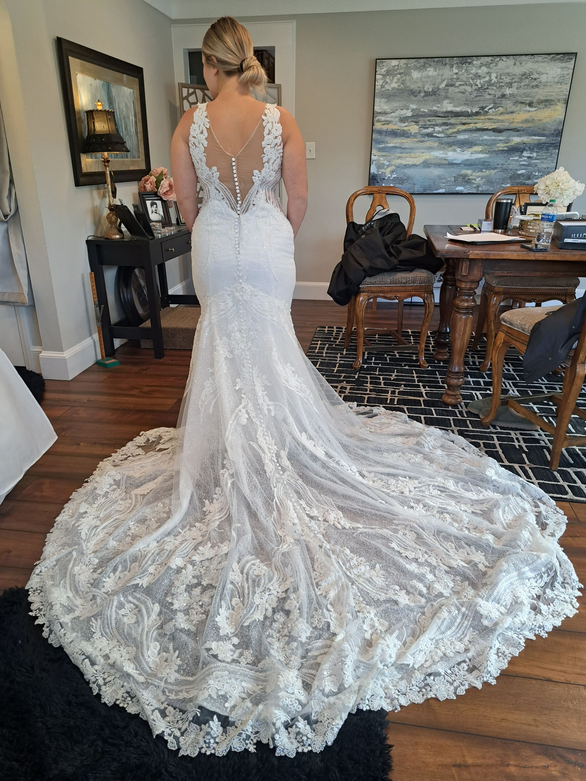 Woman in wedding gown at bridal fitting appointment with Sonya Garcia