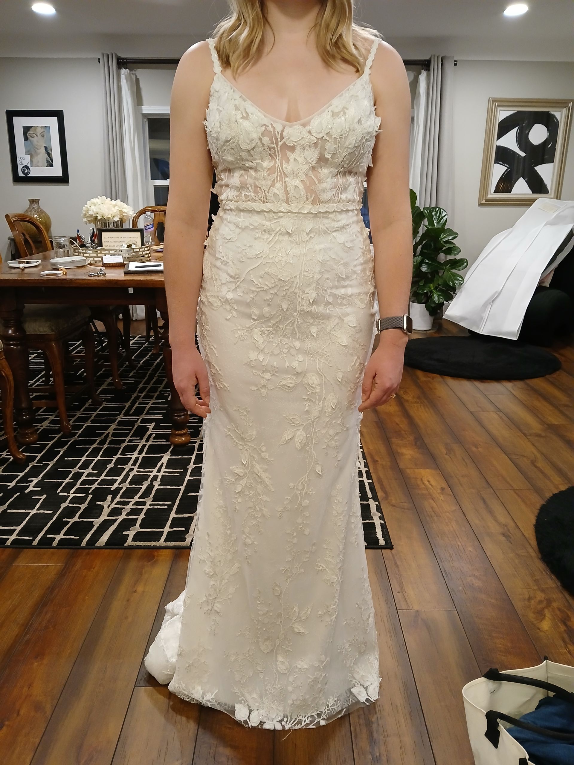 Woman in wedding gown at bridal fitting appointment with Sonya Garcia
