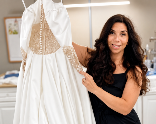 Sonya Garcia in her studio fitting a wedding gown