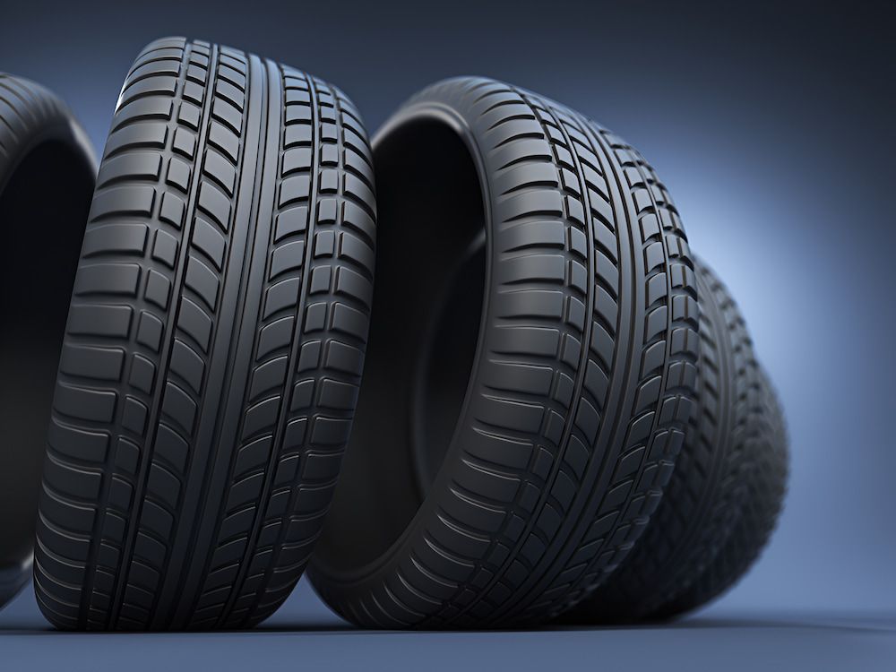 Three Tires Are Stacked On Top Of Each Other — Border Bandag Tyre Service In South Albury, NSW