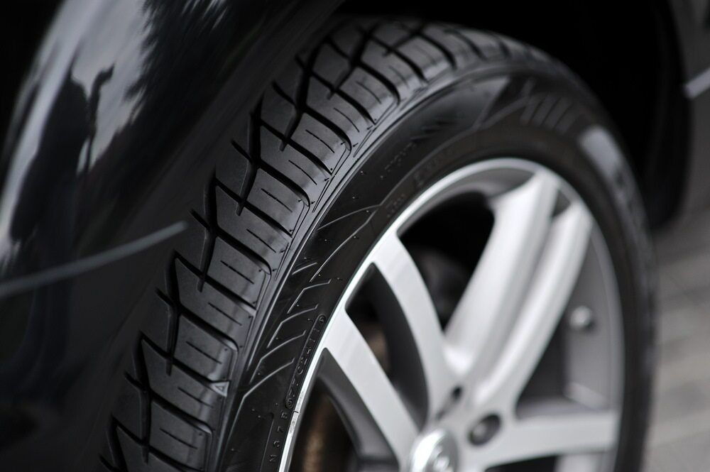 Black Car Tyre And Rim Closeup In Albury