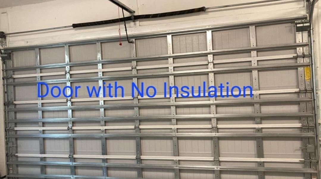 A picture of a garage door with no insulation.