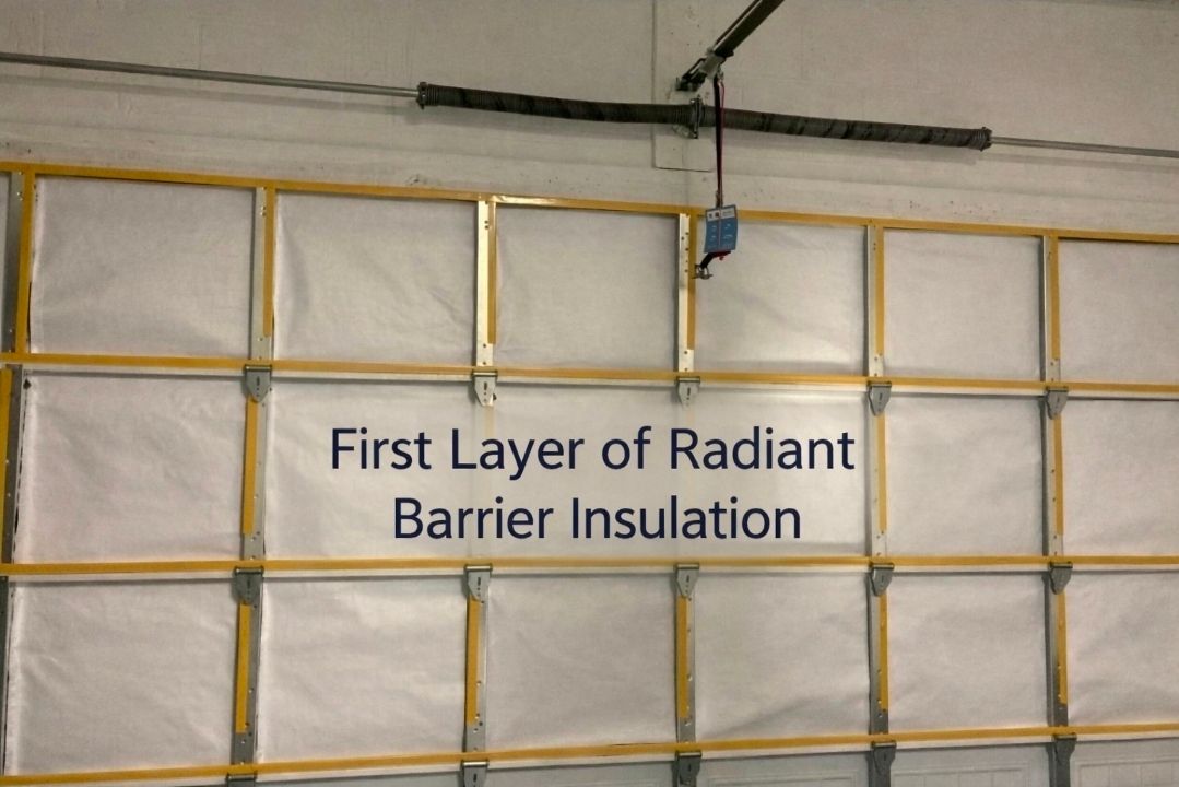 A picture of a garage door with the words first layer of radiante barrier