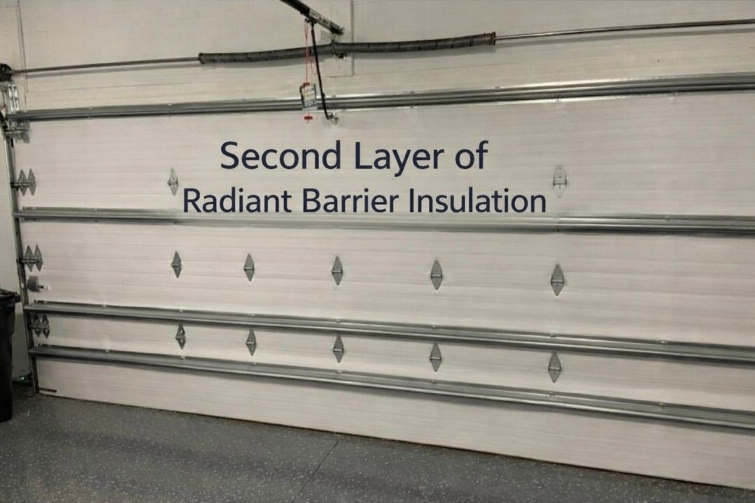 A garage door with the words second layer of radiante barrier on it