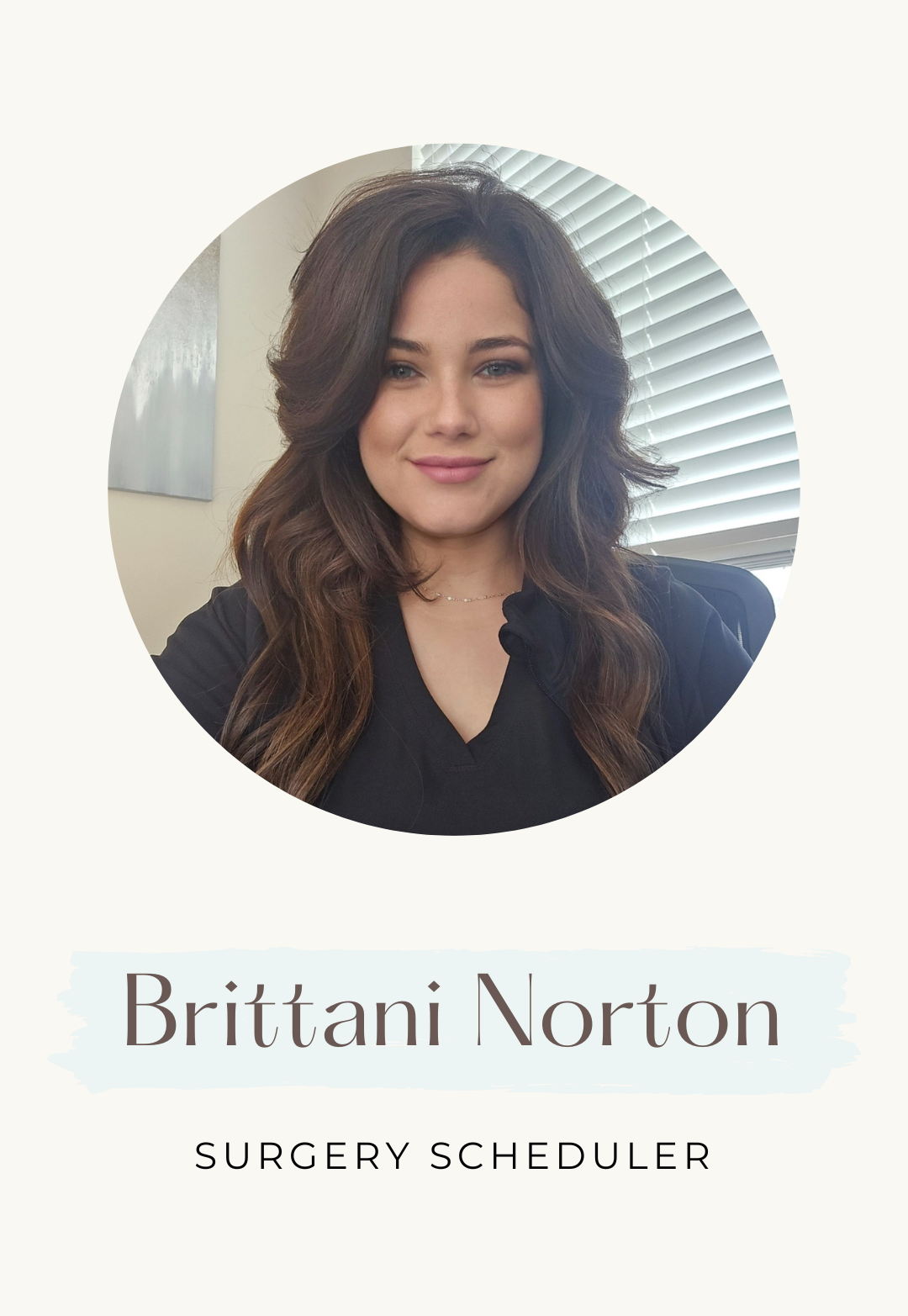 Portrait of Brittani Norton, Surgery Scheduler. Woman with brown hair, wearing black, smiling. Office background.