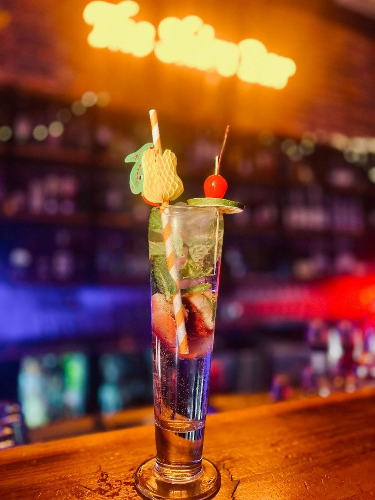 Refreshing tall cocktail with fruit garnish at The Shire Bar.— The Shire Bar & Grill In Dubbo, NSW